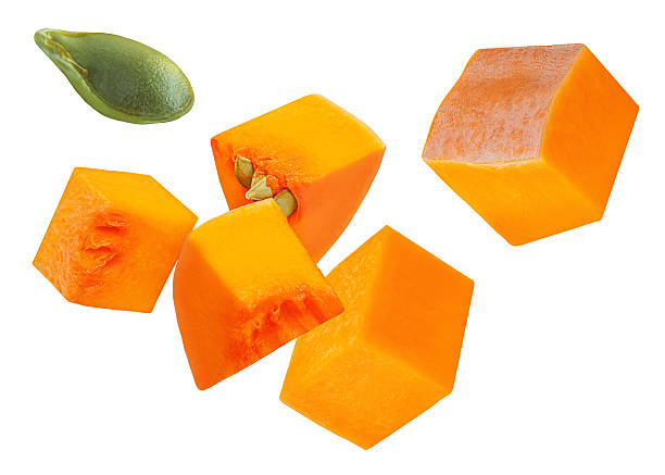 istock Levitating pumpkin pieces isolated on white background. High Quality  Flying Broken pumpkin  chunks with seeds. Pumpkin explosion. Top view. Flat lay. 2246354978