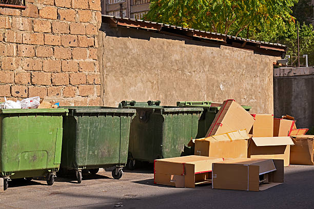 istock A pile of trash is sitting in front of a brick wall 2246358041