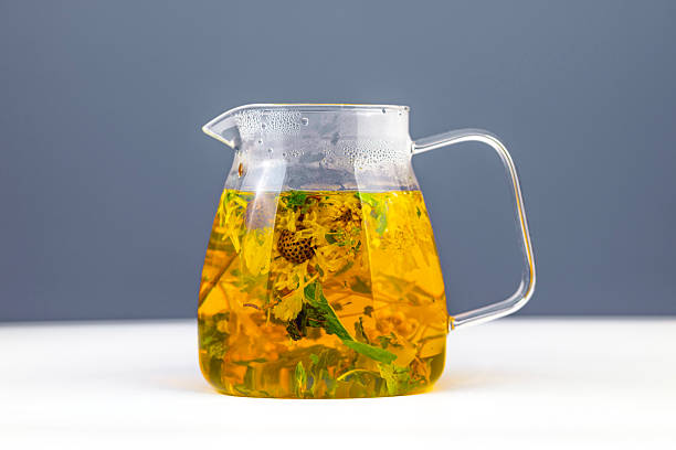 istock A glass pitcher of tea with a flower in it 2246359216