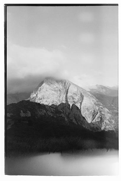 A developed black and white film picture of a mountain peak in Picos de Europa mountain range. Cantabria, Spain