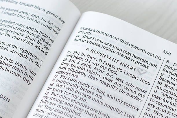 istock Repentant heart christian text in open holy bible book 2246360549
