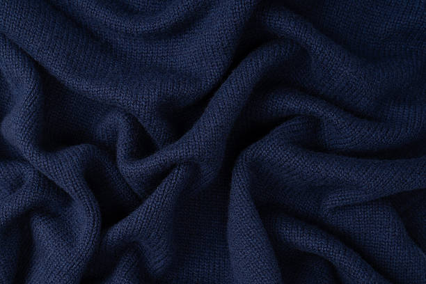istock Navy blue merino wool sweater texture as background. Top view. 2246360634