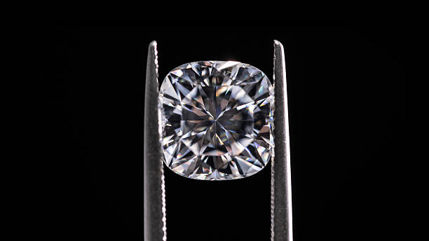 istock A diamond is displayed in a jeweler's setting 2246362169