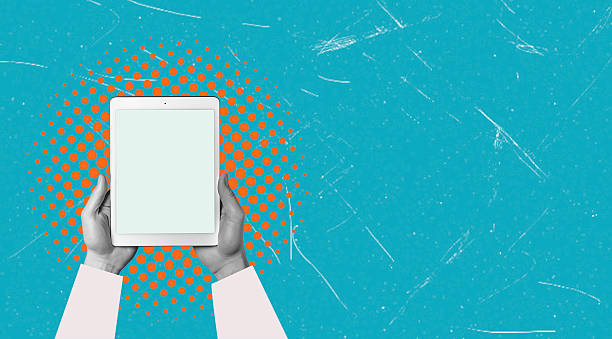 istock Hands holding a blank tablet against a vibrant blue and orange backdrop conveying digital communication intent 2246362408