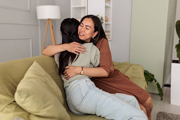 istock Mother Embracing Her Daughter 2246363401