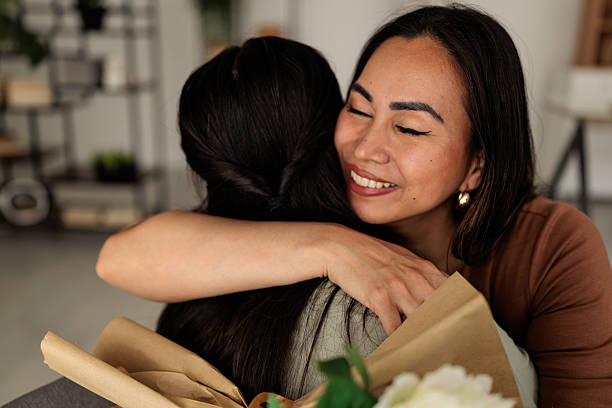 istock Mother Embracing Her Daughter 2246368246