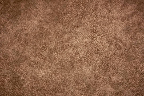 istock Dark brown vintage leather skin sheet texture background 2246369034