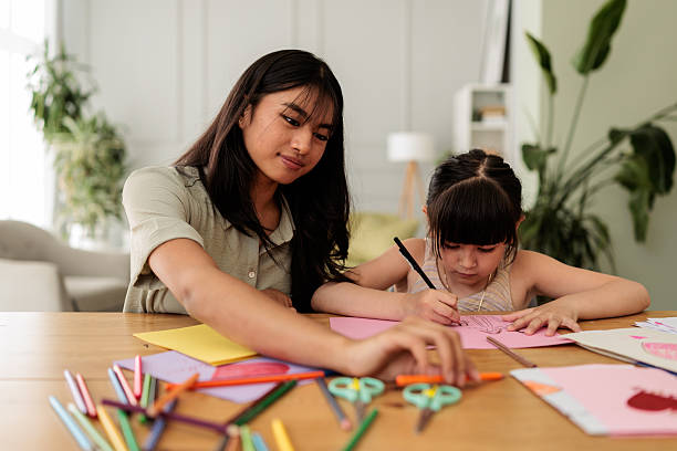 istock Joyful Moment of Sisters Creating Art Together 2246379645