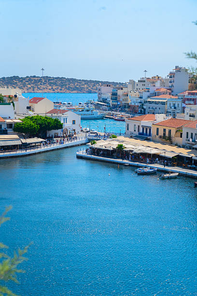 lake in harbour of Agios Nikolaos, Crete, Greece retro toned