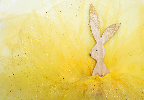 little easter bunny with yellow background