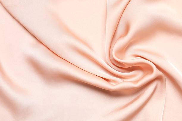 istock Top view of beige silk satin 2246393050