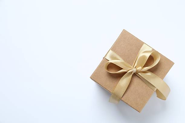 istock beautiful craft gift with ribbon on white background 2246393072