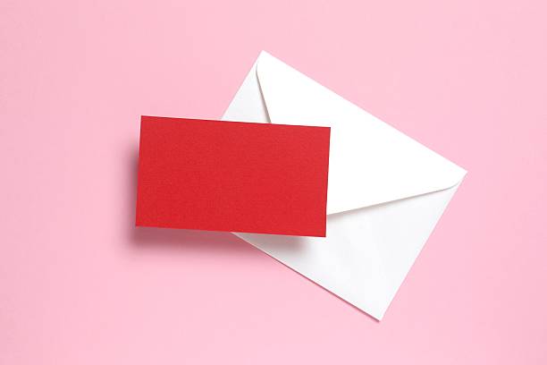 istock Red paper card on color background 2246393283