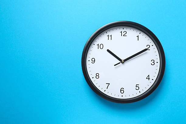 istock Big beautiful stylish clock on blue background 2246393479
