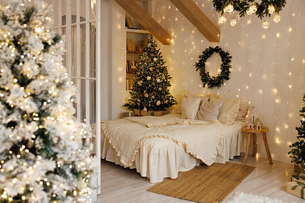 istock Cozy Christmas Bedroom Interior with Festive Lights and Decorated Tree 2246402838