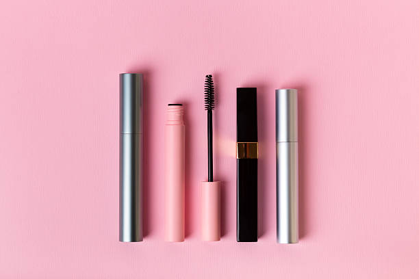 istock Different types of mascara on pink background. 2246405974
