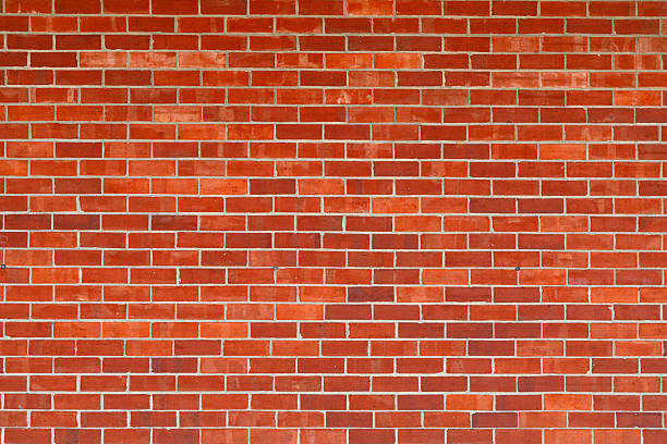 istock Brick wall, vintage texture. Red brick wall for construction themes. Brick wall background. Textured bricks for design projects. Solid bricks structure close-up. Brick wall pattern. 2246406707