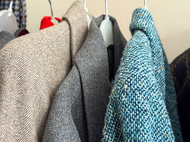 istock Women's jackets hanging on hangers. Warm clothing. Jackets collection 2246410345