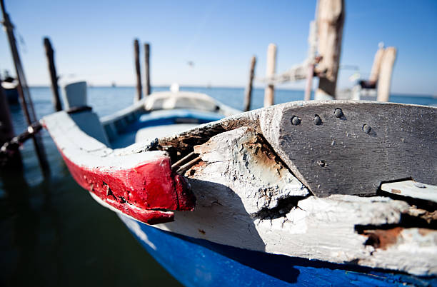 Pellestrina - Venice, Italy - October 08, 2025. Old fishing boat  in Venetian Lagoon.