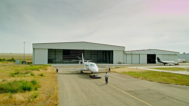 istock Private Plane Being Towed Onto Tarmac / Runway - Aerial 2246422287