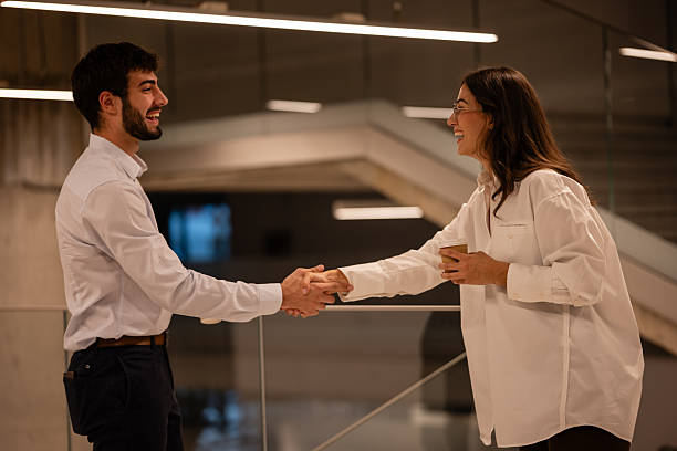 istock Business colleagues shaking hands acknowledging agreement after meeting 2246426911