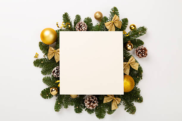 istock Festive Christmas tree branches with mock up black on color background, top view 2246427169