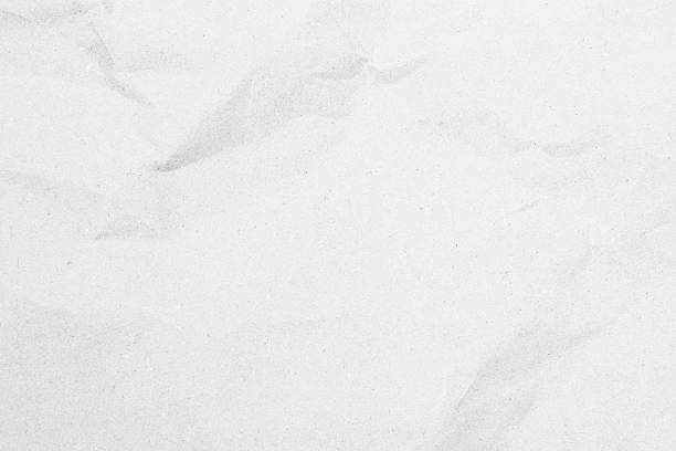 istock White recycled craft paper texture as background with copy space for text. 2246429131
