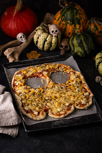 istock Halloween scary pizza in shape of ghost 2246429869