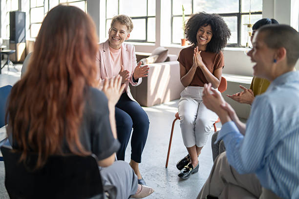 istock Diverse businesswomen clapping in a modern office meeting 2246430684