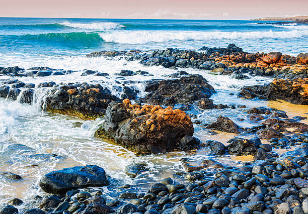 Waves Breaking Over Tide Pools on Kepuhi Beach, Molokai, Hawaii, USA