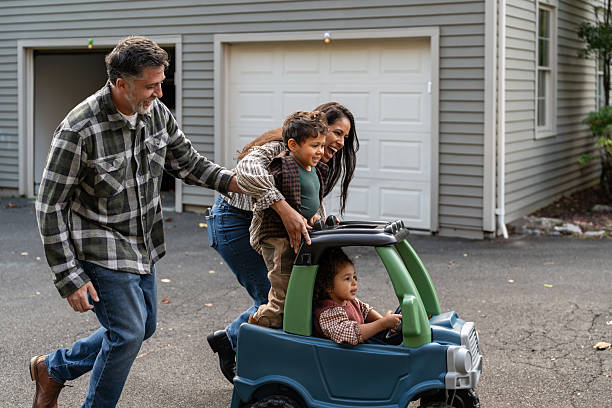istock Family having fun together outdoors 2246433471