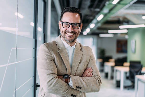 istock Confident businessman in modern office. 2246435303