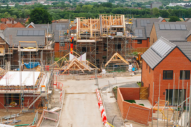 istock Aerial view from drone at residential house building construction site 2246454851