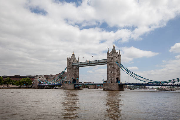 London, United Kingdom - June 21, 2017: Gothic Revival Tower Bridge on River Thames. Bridge is grade I listed combined bascule and suspension
