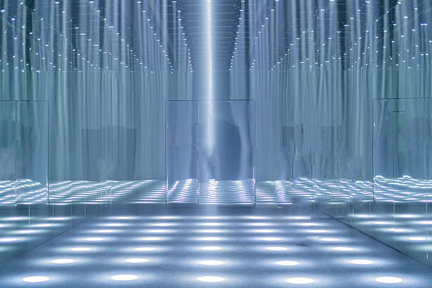 Many spotlights or lasers are turned on in the room