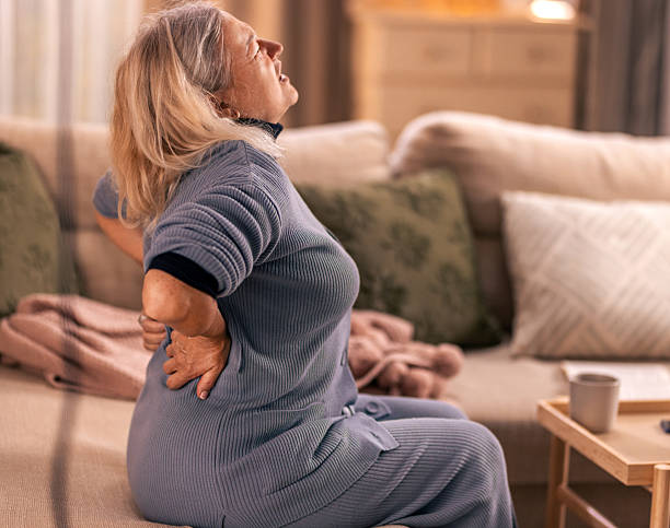 istock Elderly woman suffering from sudden back pain 2246463720