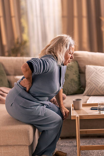 istock Elderly woman suffering from sudden back pain 2246463742