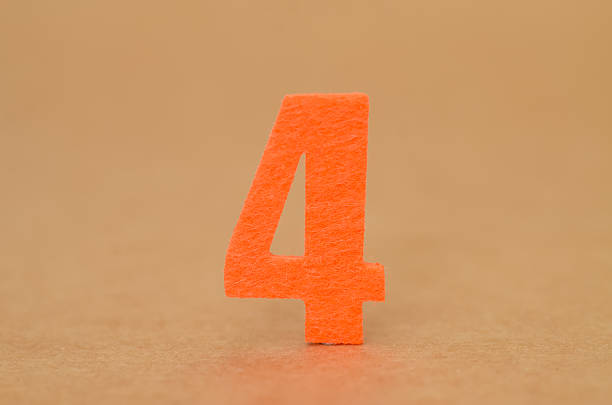 ocus on Four: A Basic Math Concept. This clear, close-up image of the number 4 is perfect for teaching materials, lessons, and educational content.
