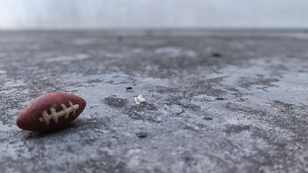 The textured surface of weathered concrete, with its rugged, aged appearance and intricate patterns of cracks and subtle variations. The muted grey tones and raw, industrial feel make it a versatile choice for design elements such as backgrounds, overlays, or wallpapers