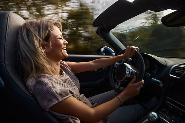 istock Diving a convertible in blurred motion! 2246467401