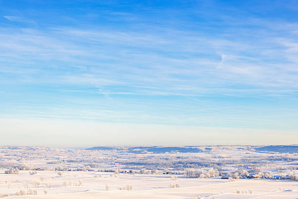 An island surrounded by a frozen lake in northern Manitoba