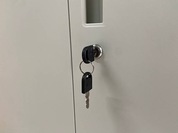 istock Close-Up of Metal Cabinet Lock for Secure Home Storage 2246471149