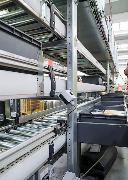 istock packing line in a logistics warehouse. conveyor belt in a modern production line 2246471615
