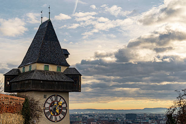istock Historic Clock Tower Overlooking Graz City Skyline at Sunrise, Austria 2246474765