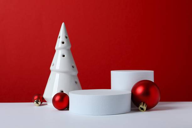 istock Beautiful composition with podiums and Christmas decor on two-tone background 2246475171