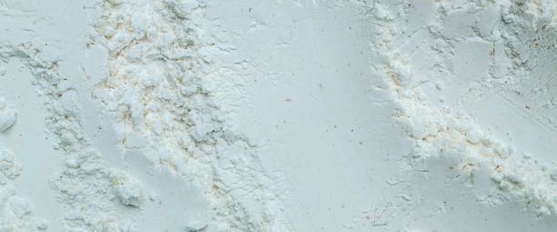 istock uneven texture of coarse and fine white powder 2246475210