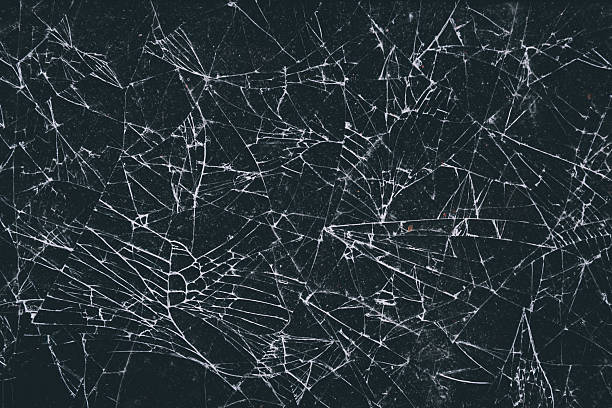 istock The pattern on the glass is cracked.  damage to the glass.  cracked texture 2246475708