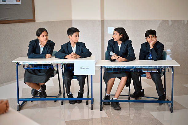 istock Middle school Team discusses internally during Quiz/ debate competition 2246476301