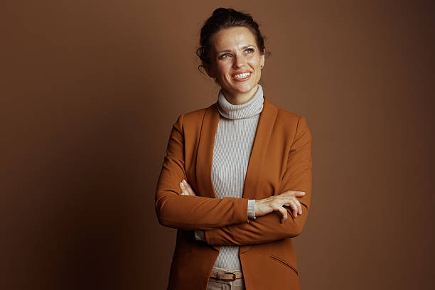 istock Optimistic Businesswoman with Upward Gaze 2246480095
