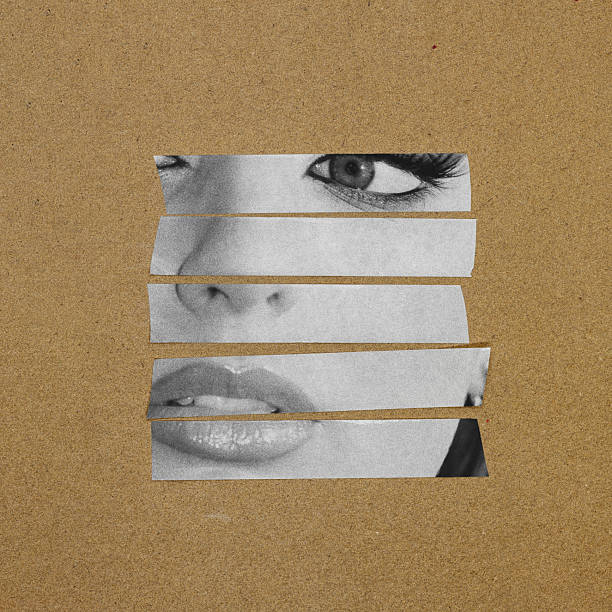 istock Abstract woman portrait on cut plastic strips on beige grunge background 2246481711
